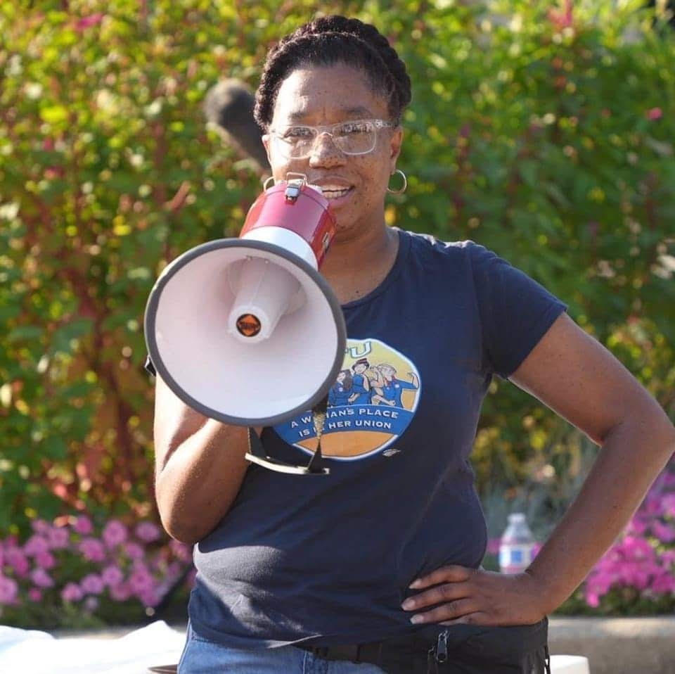 Lillian Brents speaking at a community rally